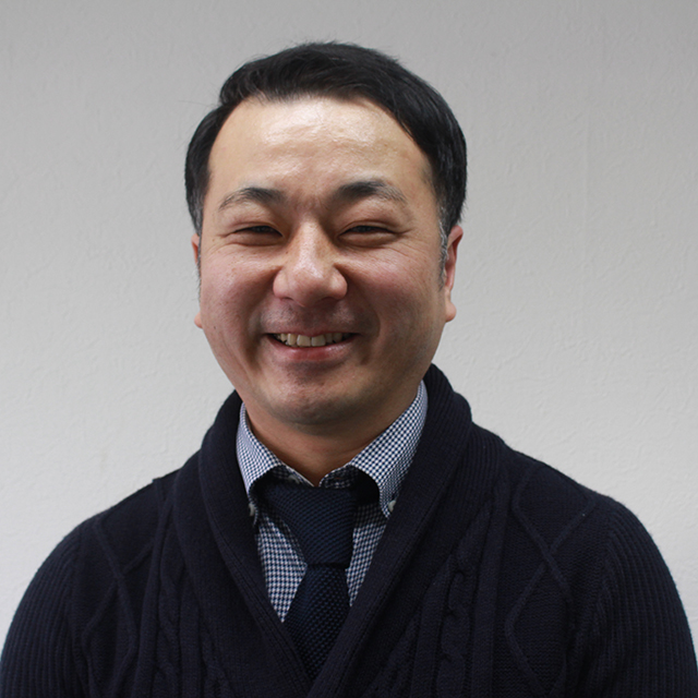 専務取締役　坂本賢一